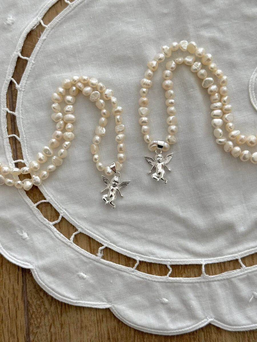 'Baby Cherub' on Sweet Water Pearl - Silver 925